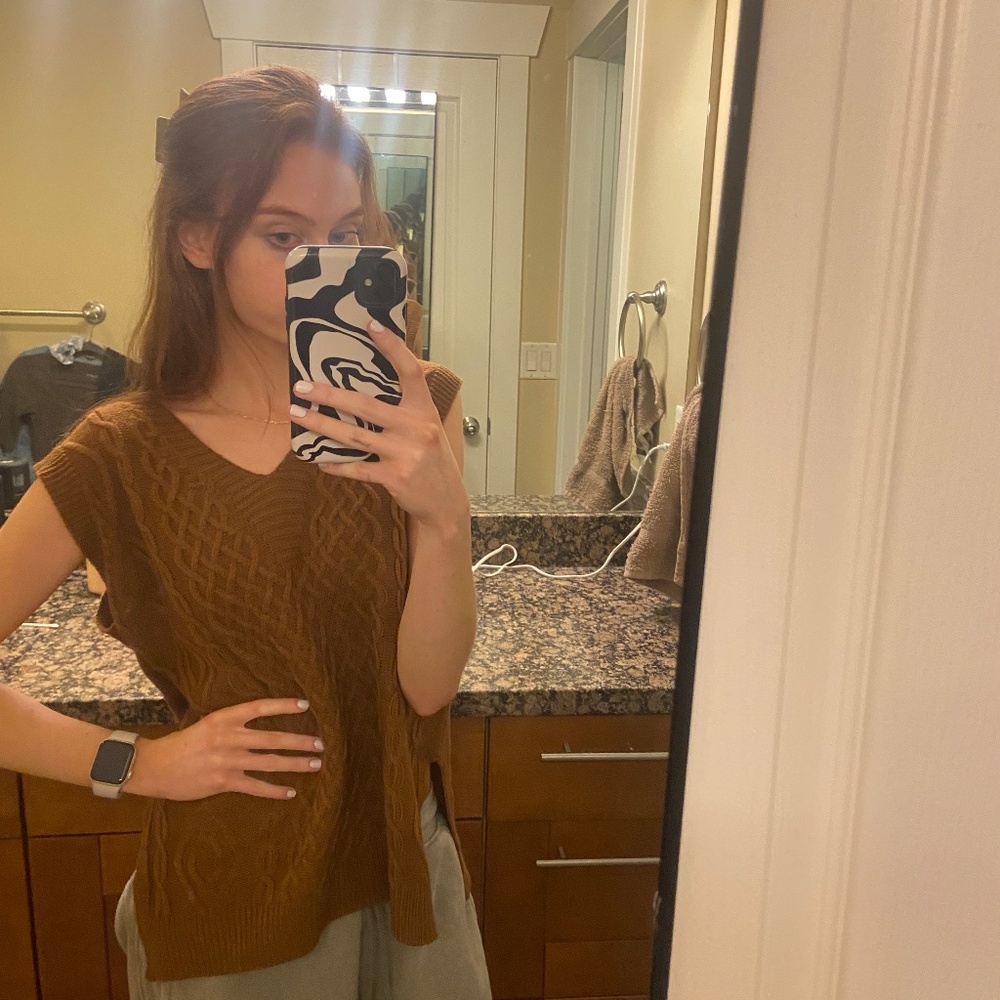 Brown Sweater Vest .